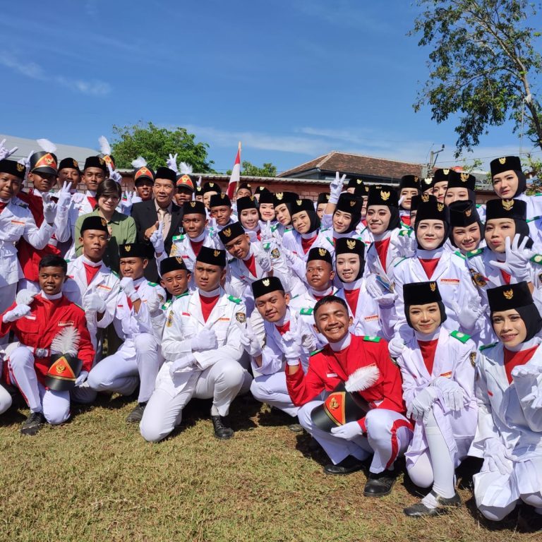 Together with The Teacher of MTsN 1 Pati, Miss Giulia Attended The RI Anniversary Ceremony in Winong District